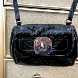Black LongChamp crossbody bag.
